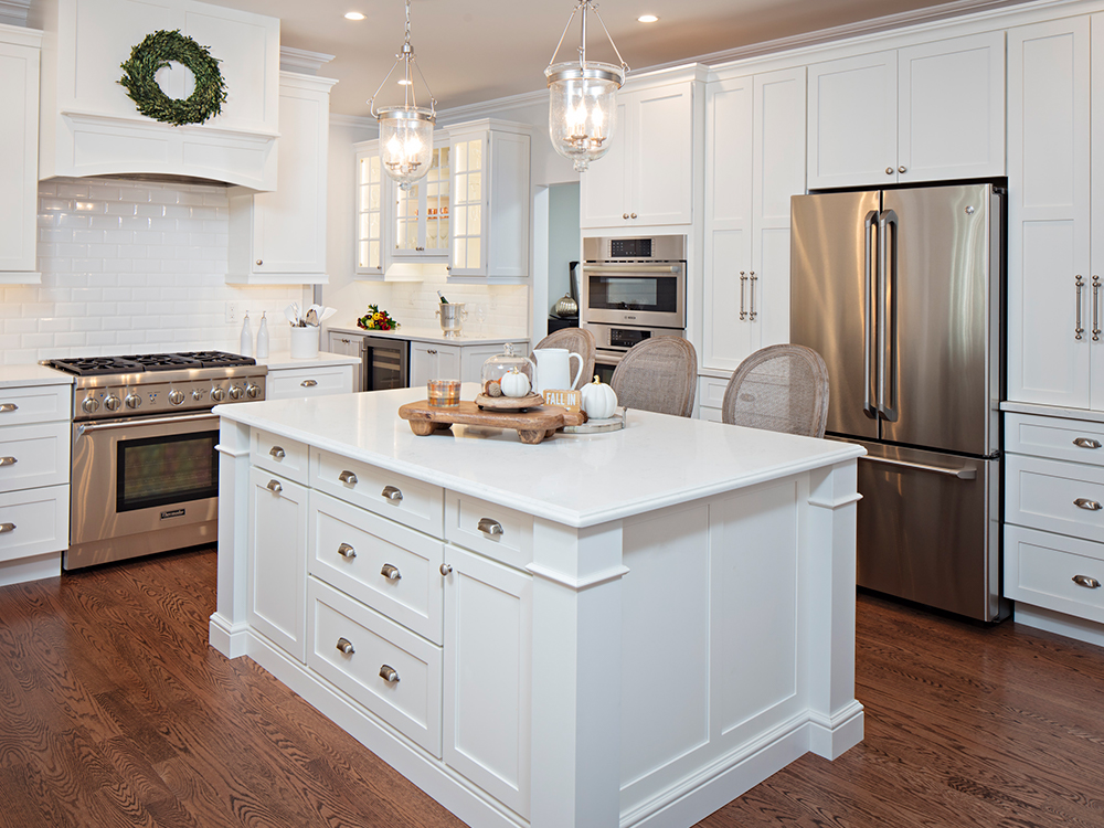 White kitchen cabinets and island