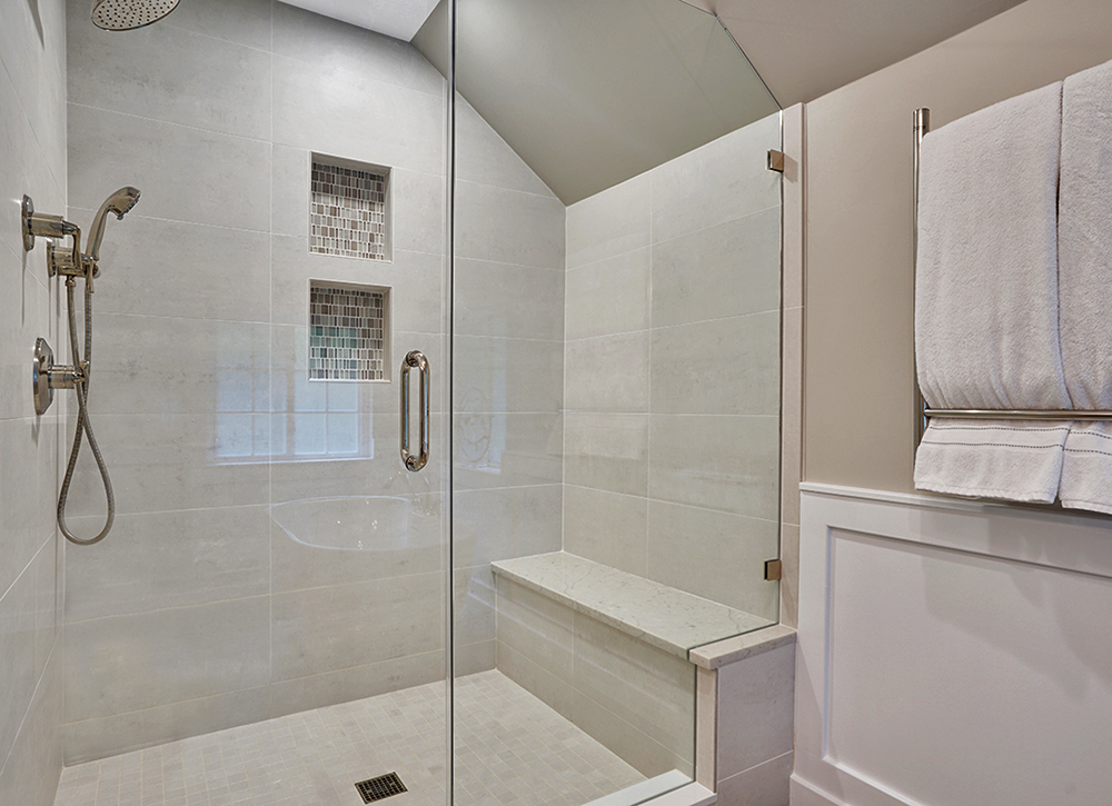 Master bathroom walk-in shower with glass door